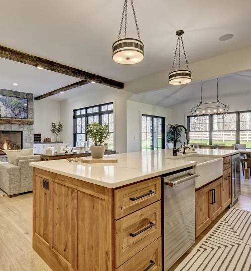 farm house full open concept of kitchen living room and nook layout with ceiling beams - Copy (2)
