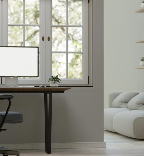 Minimal white home working space interior design with computer mockup on a table