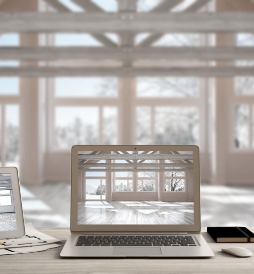 Architect designer desktop concept, laptop and tablet on wooden work desk with screen showing interior design project and CAD sketch, blurred draft background, scandinavian empty space idea template